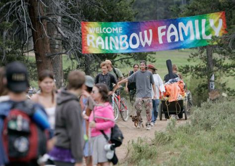 Rainbow Family members arrive in the Routt National Forest north of Steamboat Springs, Colo., in 2006, when the event drew about 20,000 people. Officials say the group may come to the Black Hills this summer. 